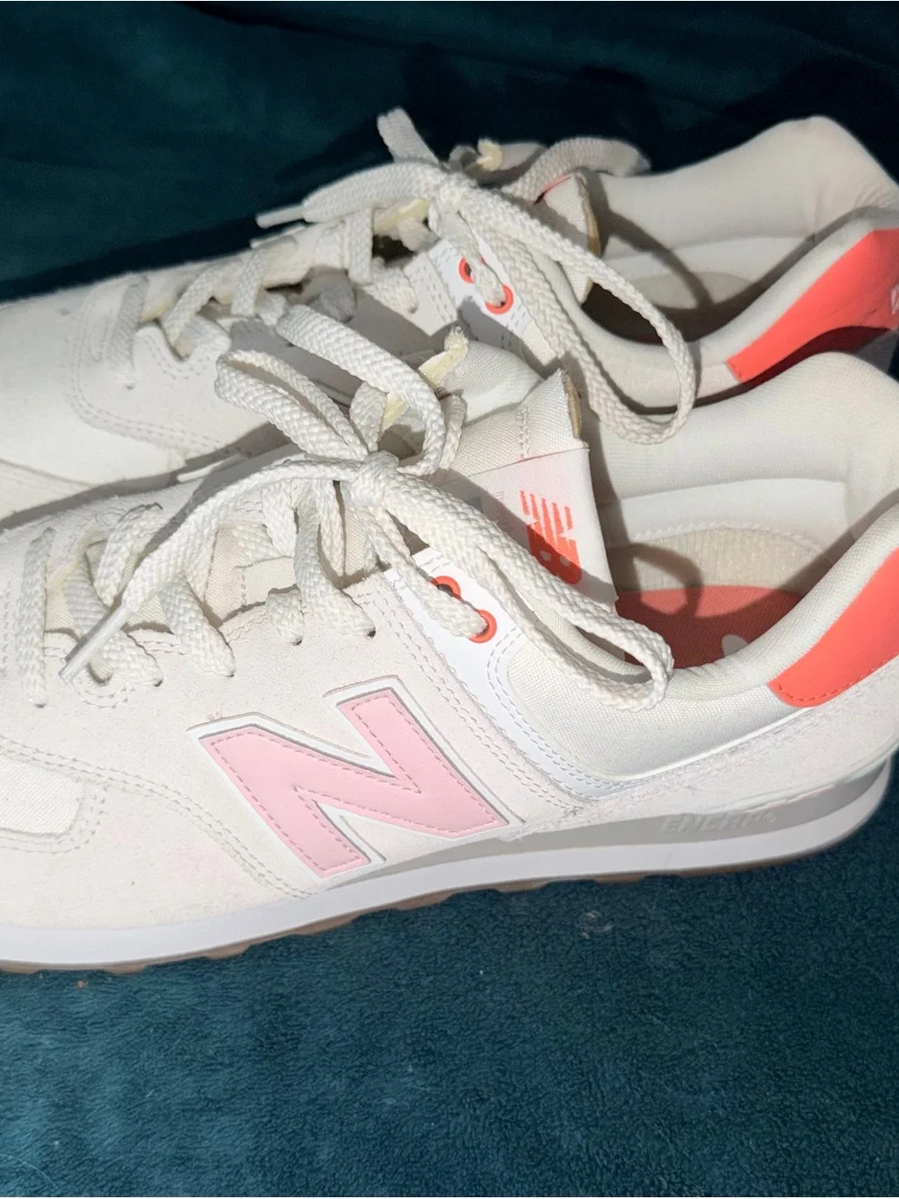 New Balance Women’s Cream Sneakers with Pink Accents